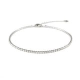 Тенис гривна за глезен с искрящи камъни, идеална за всекидневно носене и стилен акцент.