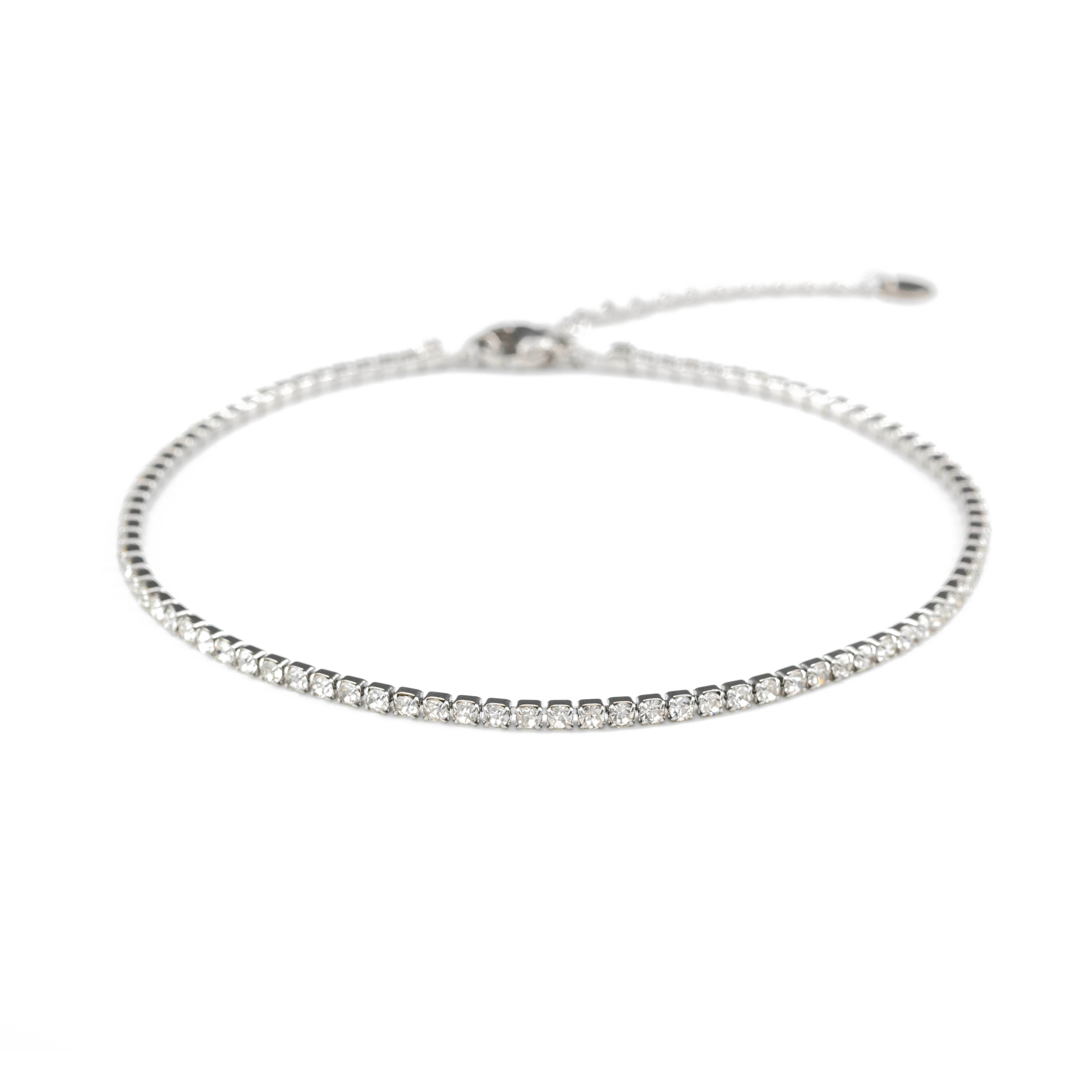 Тенис гривна за глезен с искрящи камъни, идеална за всекидневно носене и стилен акцент.