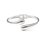 Сребърна гривна с изчистен дизайн и уникални детайли, изработена от медицинска стомана.