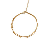 Двойна гривна за глезен в златисто с квадратчета