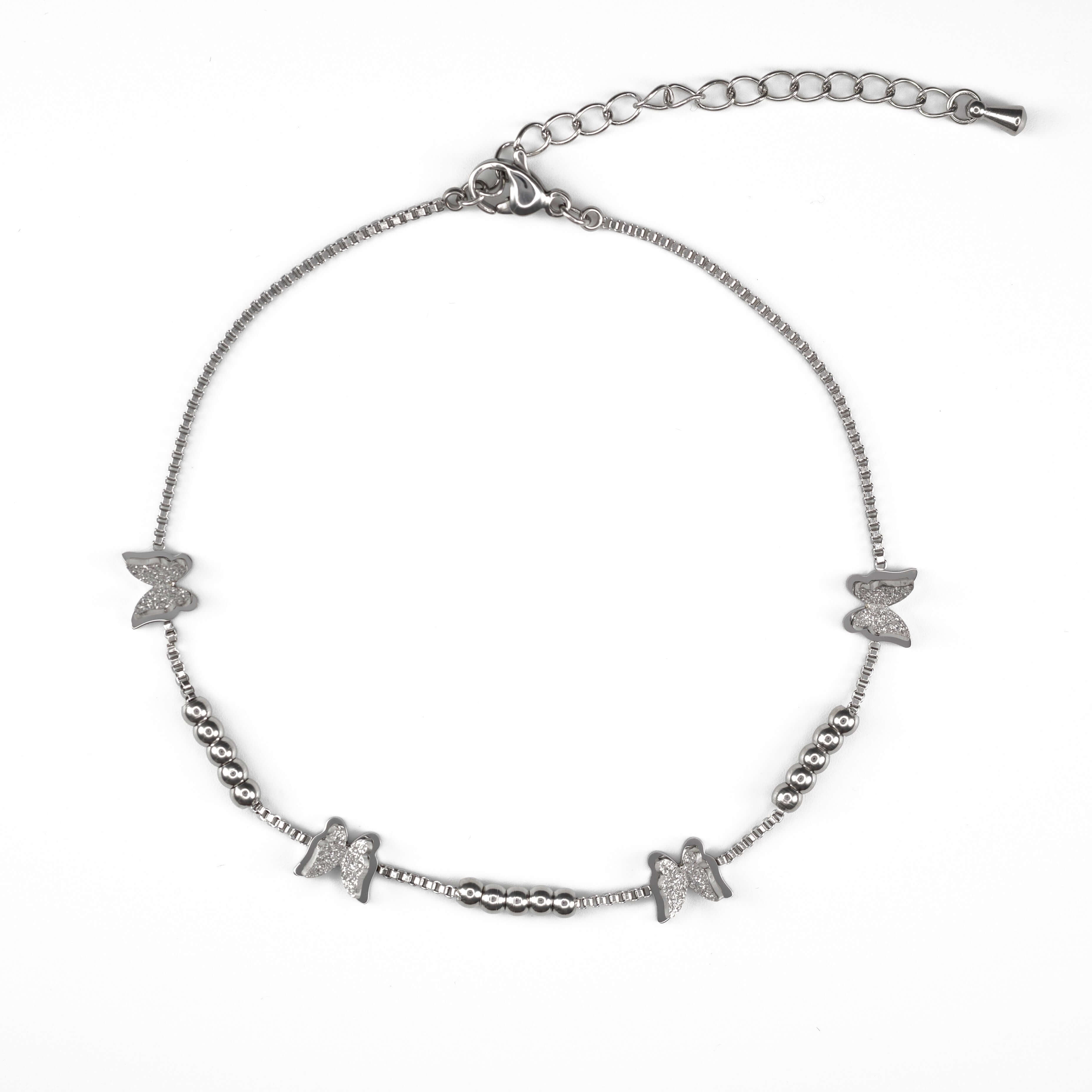 Гривна за глезен с пеперуди от неръждаема стомана, символизираща свобода и трансформация.