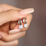 Сребърни Обеци Liora S925, изработени от стърлингово сребро с блестящи камъни.