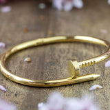 Βραχιόλι από χειρουργικό ατσάλι "Καρφί" - χρυσό