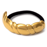 Ластик за коса 'Кроасан' в златен цвят, стилен и елегантен аксесоар за прическа.