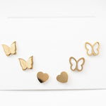 Gold butterfly and heart earrings set, perfect for multiple piercings and stylish looks.