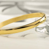 Овална златиста гривна