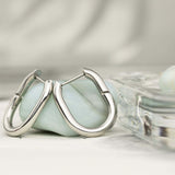 Οβάλ ασημένια ατσάλινα σκουλαρίκια