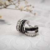 Επάργυρα σκουλαρίκια με μαύρο φίλντισι και κρύσταλλα