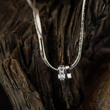 Ασημένιο διπλό κολιέ με δαχτυλίδια