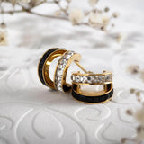 Χρυσά σκουλαρίκια με μαύρα φίλντισι και κρύσταλλα