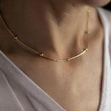 Χρυσό κολιέ με χάντρες