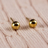 Καρφωτά χρυσά σκουλαρίκια μπάλα